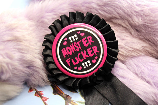 Pink and Black Monster Fucker Rosettes (58mm)