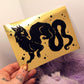 Black Wyrm on Gold Foil Background A6 Print