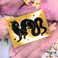 Black Wyrm on Gold Foil Background A6 Print