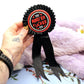 Red and Black Monster Fucker Rosettes (58mm)
