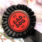 Bad Dog Red and Black Rosettes (58mm)