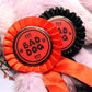 Bad Dog Red and Black Rosettes (58mm)