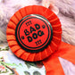 Bad Dog Red and Black Rosettes (58mm)