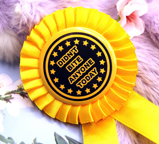 Didn't Bite Anyone Today Gold and Black Rosettes (58mm)