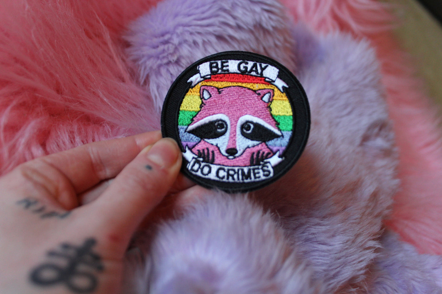 Be Gay Do Crimes Iron-On Patch (60mm) - pink raccoon embroidered patch